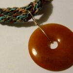 Orange Carnelian Gemstone Pendant on Brown