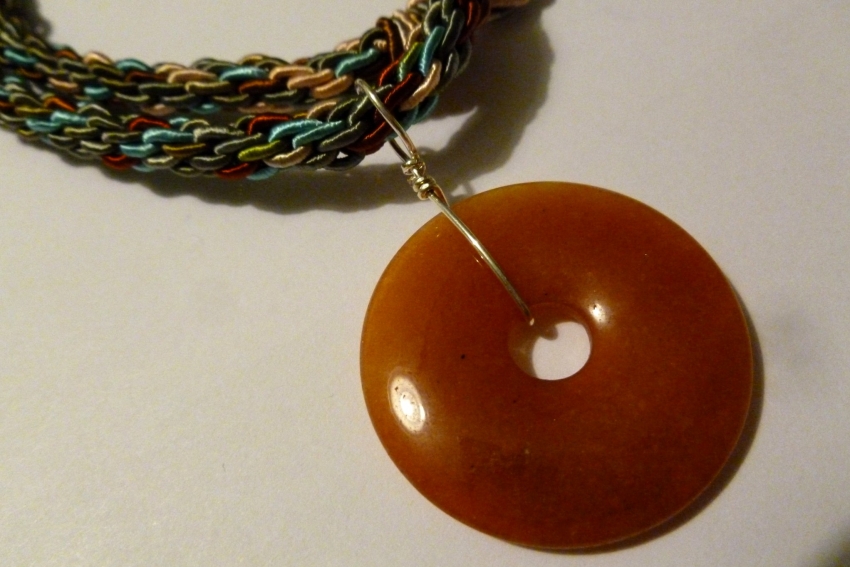 Orange Carnelian Gemstone Pendant on Brown